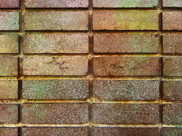 closeup stained home red brown brick wall house exterior building bricks vintage retro old stock photo