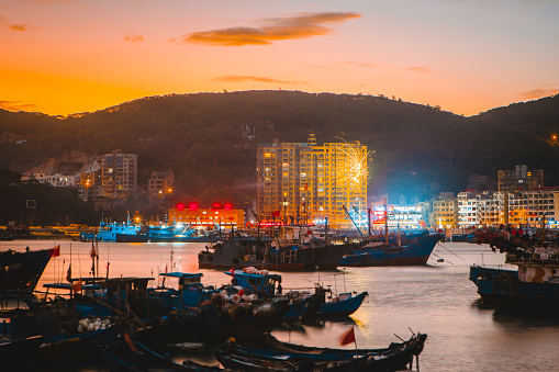 Fishing boats docked at dusk in Huangqi Town, Lianjiang County, Fujian Province