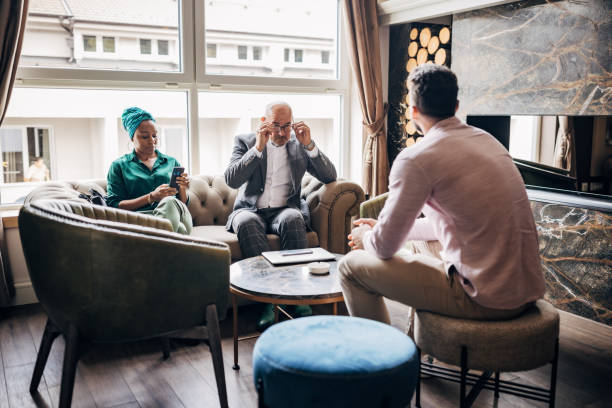 istock Business people in hotel lobby 1445511289