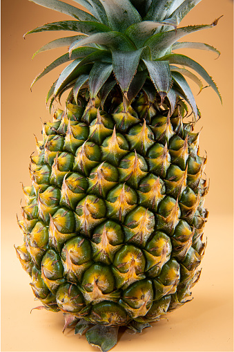 Many pineapples on super market.