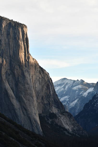 istock El Capitan with Sun Highlight and Snow Covered Peaks 1445513436
