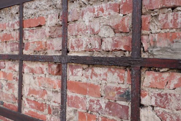istock an old stone wall  with steel beams 1445513622