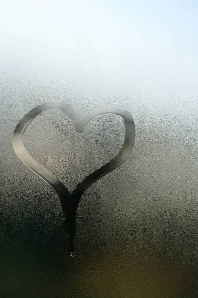 istock Condensation on the window from a sudden change in temperature outside and inside the house. 1445515083