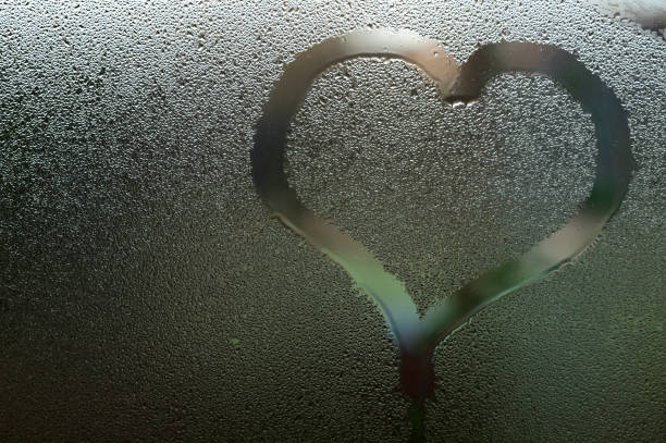 istock Condensation on the window from a sudden change in temperature outside and inside the house. 1445515298