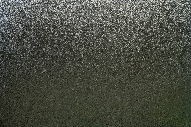 istock Condensation on the window from a sudden change in temperature outside and inside the house. 1445516011