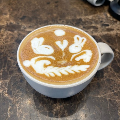 A beautiful decoration and embellishment on the coffee layer of this delicious cup of Mocca coffee
