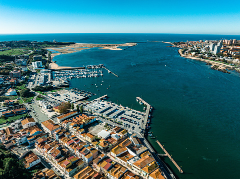 Drone view of beautiful Porto coast near the Douro river mouth in a sunny day