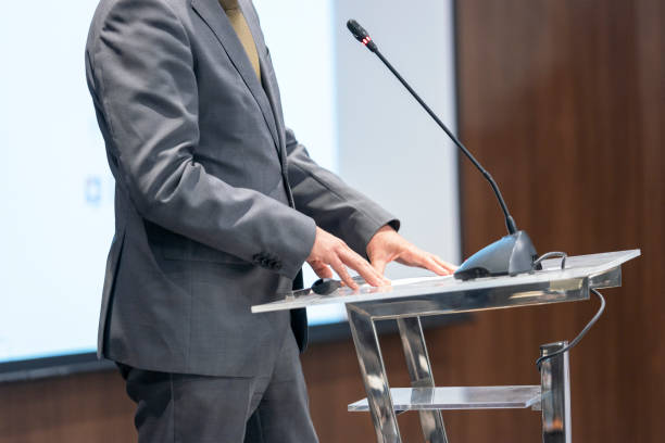 istock Speaker at business conference or presentation. Public speaking concept. 1445518819