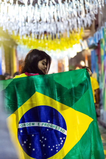 istock Indian lady, Brazil fan is celebrating 1445523767