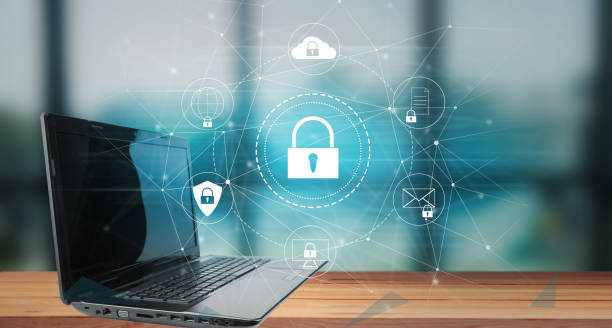 istock Business, technology, internet and networking concept with padlock. laptop on the table 1445528147