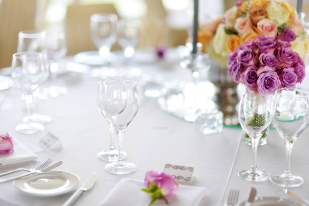istock Beautiful table setting with crockery and flowers for a party, wedding reception or other festive event 1445528500