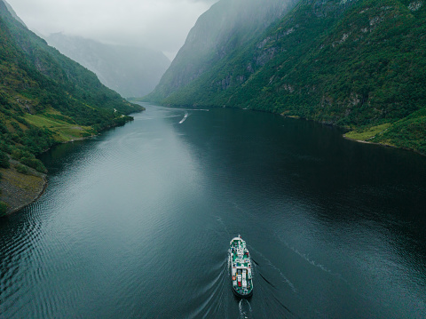 Scenic aerial view of  ferry on the Geirangerfjord in Norway