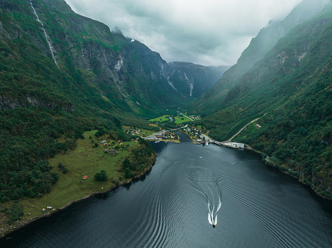 Scenic aerial view of  ship on the fjord in Norway