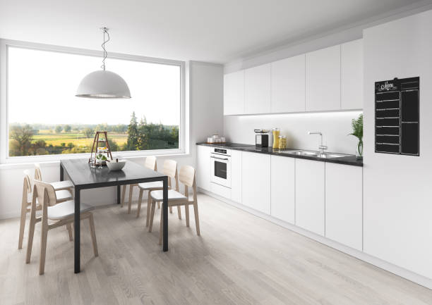 White modern kitchen with dining room stock photo