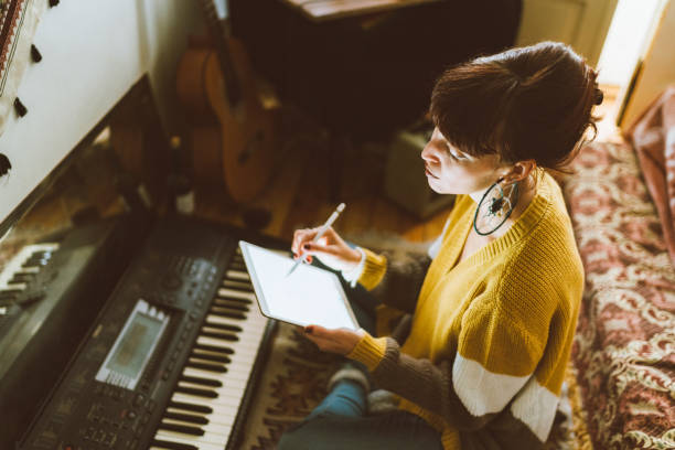 istock Young woman composing new music 1445531130