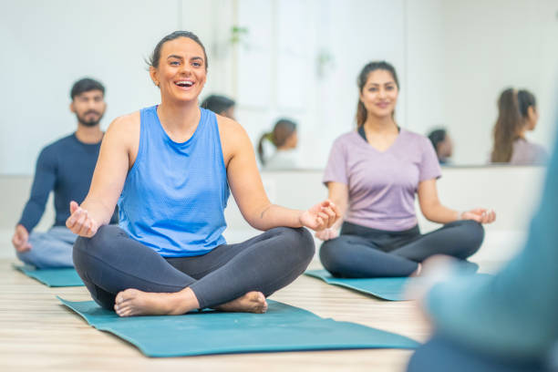 istock Adults in the Lotus Position 1445533053