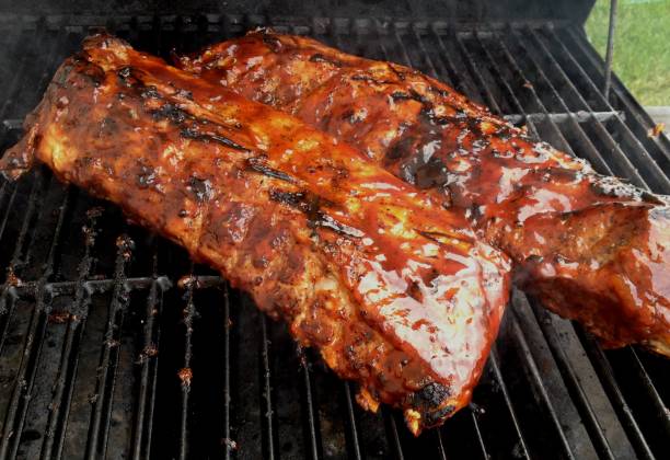 fotografii de stoc, fotografii și imagini scutite de redevențe cu agave blackberry afumat bbq coaste - porc la grătar