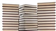 istock Growing pile of books on a white background, stop motion animation. Learning, wisdom, library concept. 1445537673