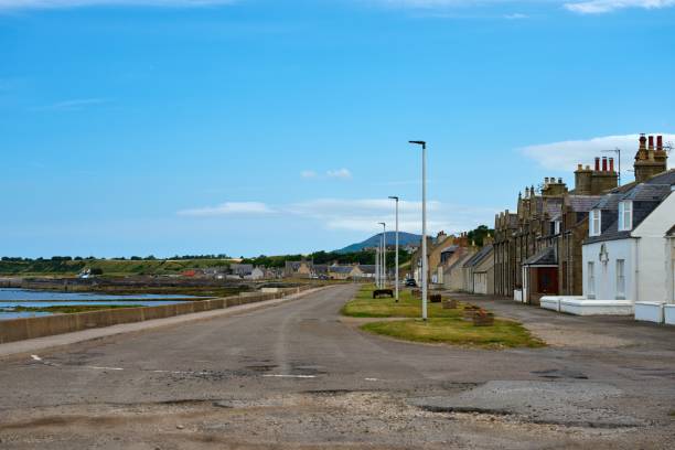 istock road on the coast with small houses 1445538461