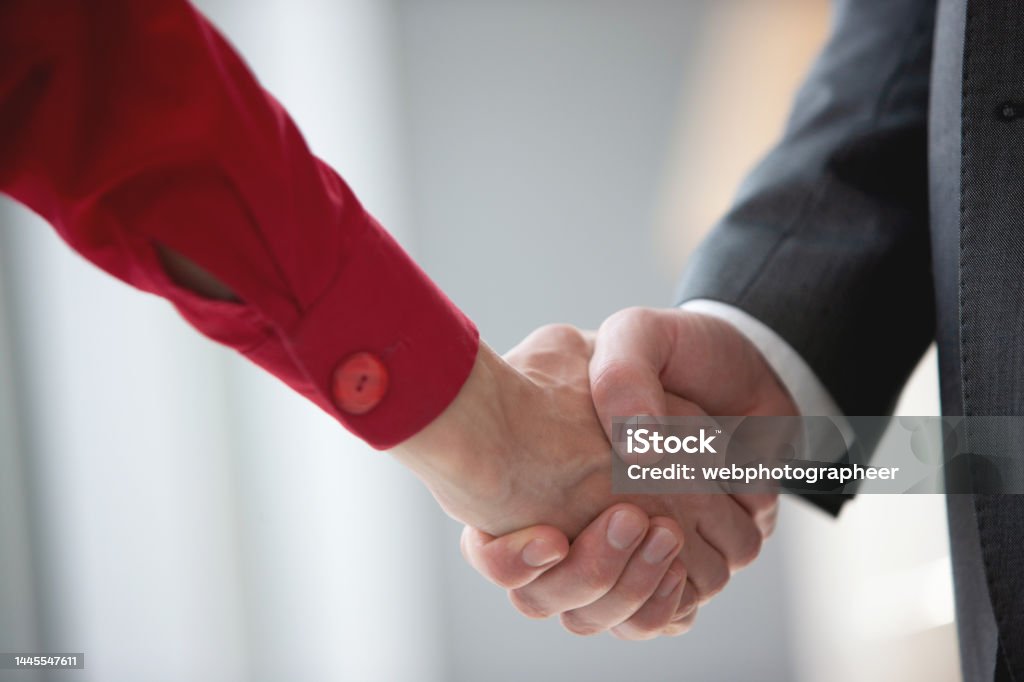 Greeting handshaking Close-up politicians shaking hands, negotiators reached an agreement Adult Stock Photo