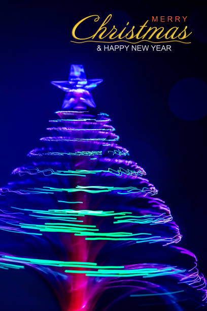 istock Merry Christmas!!! Spinning fiber optic Christmas Tree with space for copy 1445548185