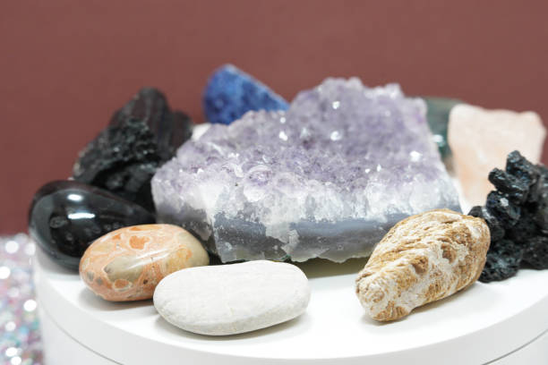 istock Quartz with mineral crystals against a black background 1445549710