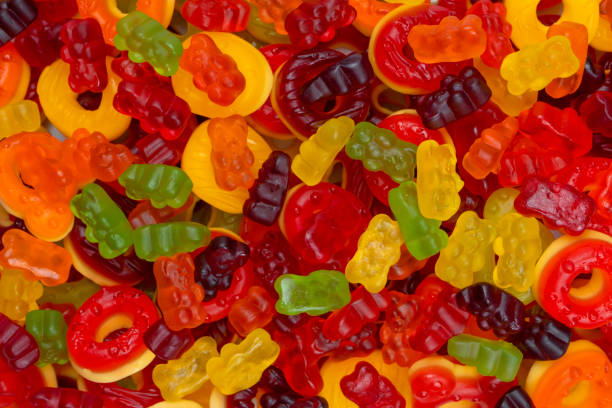 istock Assorted colorful gummy candies. Jelly donuts. Jelly bears. 1445551427