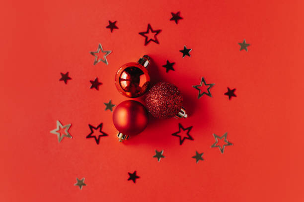 istock Beautiful Christmas ornaments on a bright red background. 1445552525