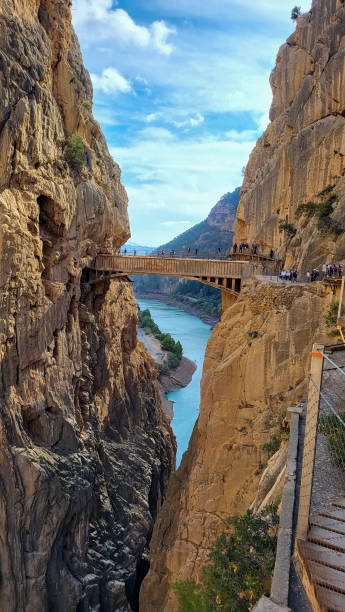 istock Royal Trail Also Known as El Caminito Del Rey - Mountain Path Along Steep Cliffs in Gorge Chorro, Andalusia, Spain 1445554101
