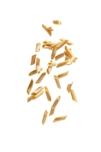 istock Whole grain pasta levitating on a white isolated background 1445555381