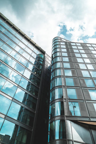 istock Low angle view of modern buildings against sky in london 1445557414