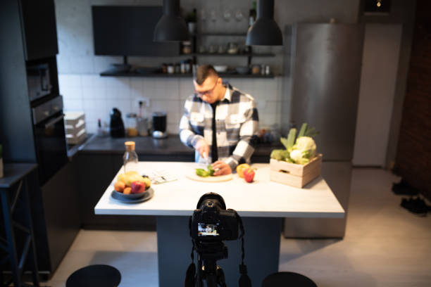 istock Recording a video at home, while preparing food in the kitchen 1445558658