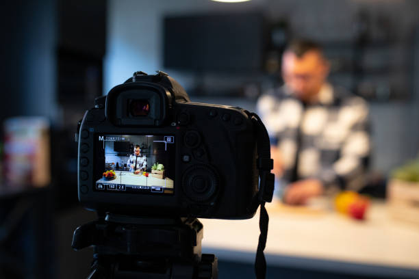 istock Recording a video at home, while preparing food in the kitchen 1445558696