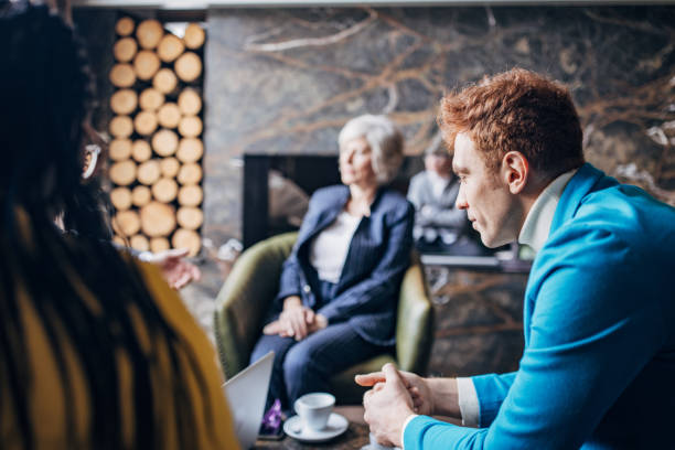 istock Business people in cafe 1445563365