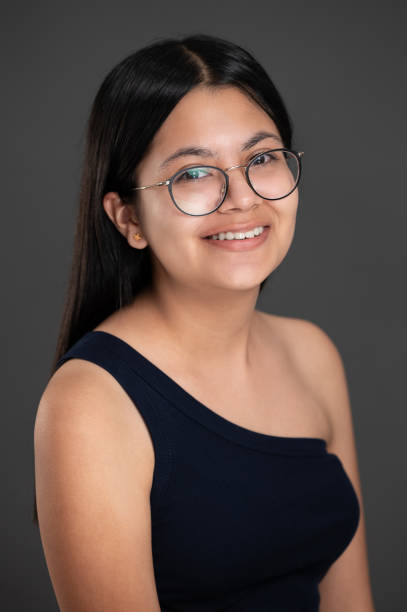 istock Smiling with teeth young latino girl 1445563420