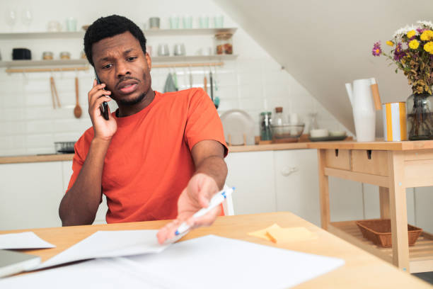 istock Young African-American designer working at his home office 1445565364