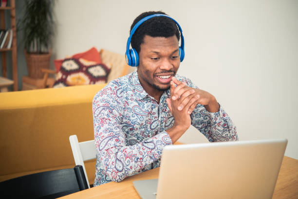 istock Young African-American freelancer working at his home office 1445565391
