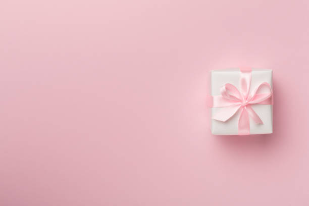 istock White gift box on color background, top view 1445567023