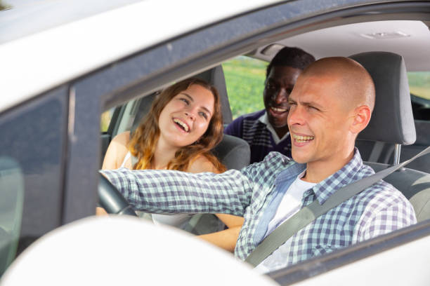 istock Friend talking in car during common trip 1445568186