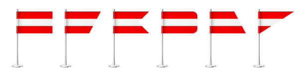 istock Realistic various Austrian table flags on a chrome steel pole. Souvenir from Austria. Desk flag made of paper or fabric, shiny metal stand. Mockup for promotion and advertising. Vector illustration 1445570016