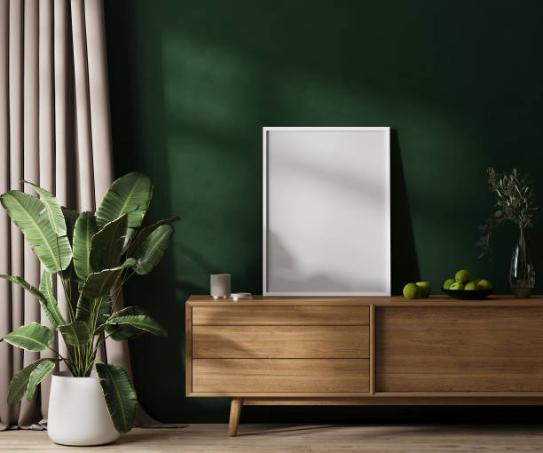 istock Empty white poster frame mock up on dresser in modern room interior with green wallwith sunlight , curtain and green plant, 3d rendering 1445575863