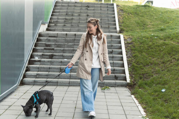 istock Young woman with dog 1445578087