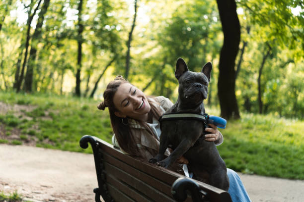 istock Young woman with dog 1445578109