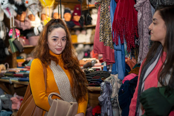istock Buying on Christmas market 1445578240