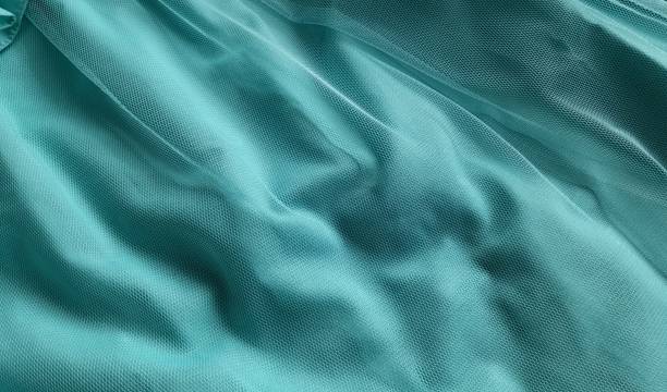 istock abstract background texture cloth or fabric material in blue or turquoise 1445582624