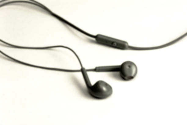 istock blur earphones isolated on white background 1445584713