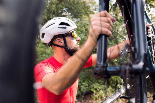 istock man dressing next to his van to go cycling 1445585059