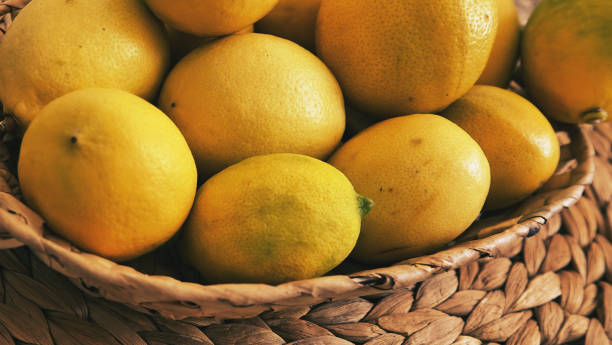 istock Mediterranean lemons in a wicker basket 1445591766