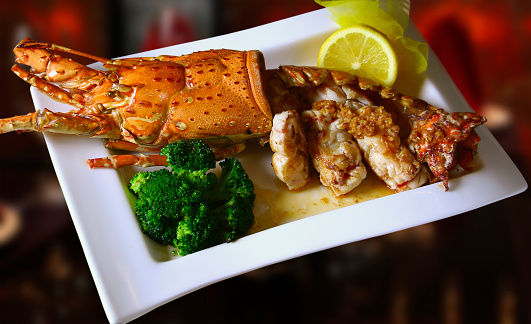 Lobster steak in a white square plate