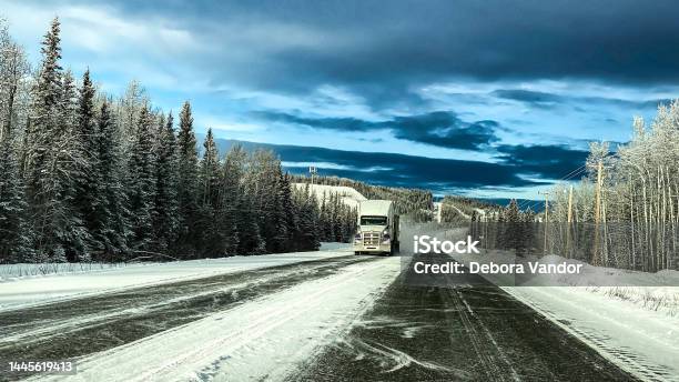 Winter Travel In Alaska This Big Rig Has To Traverse The Snow Covered Roadways In The Interior Of Alaska Stock Photo - Download Image Now